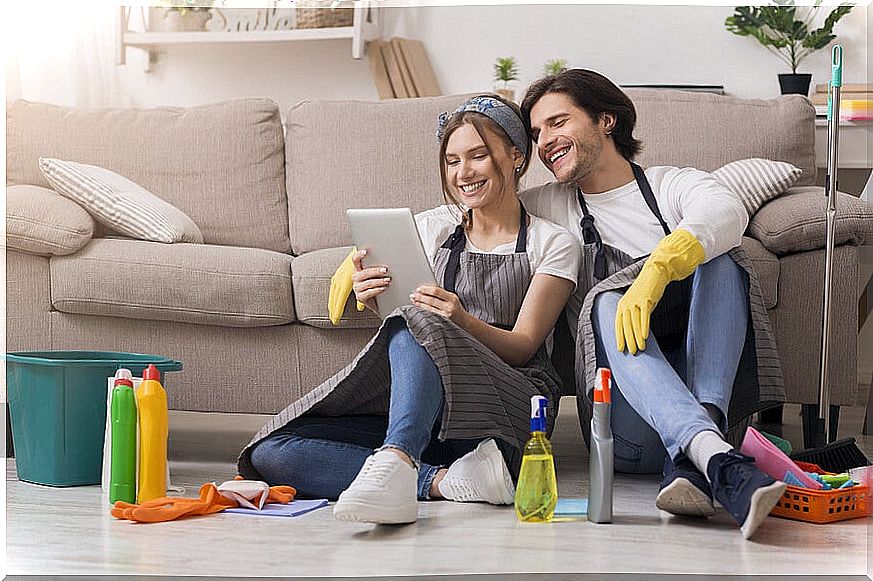 Couple handing out housework.