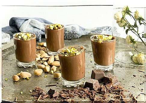 Glass of chocolate with pistachio.