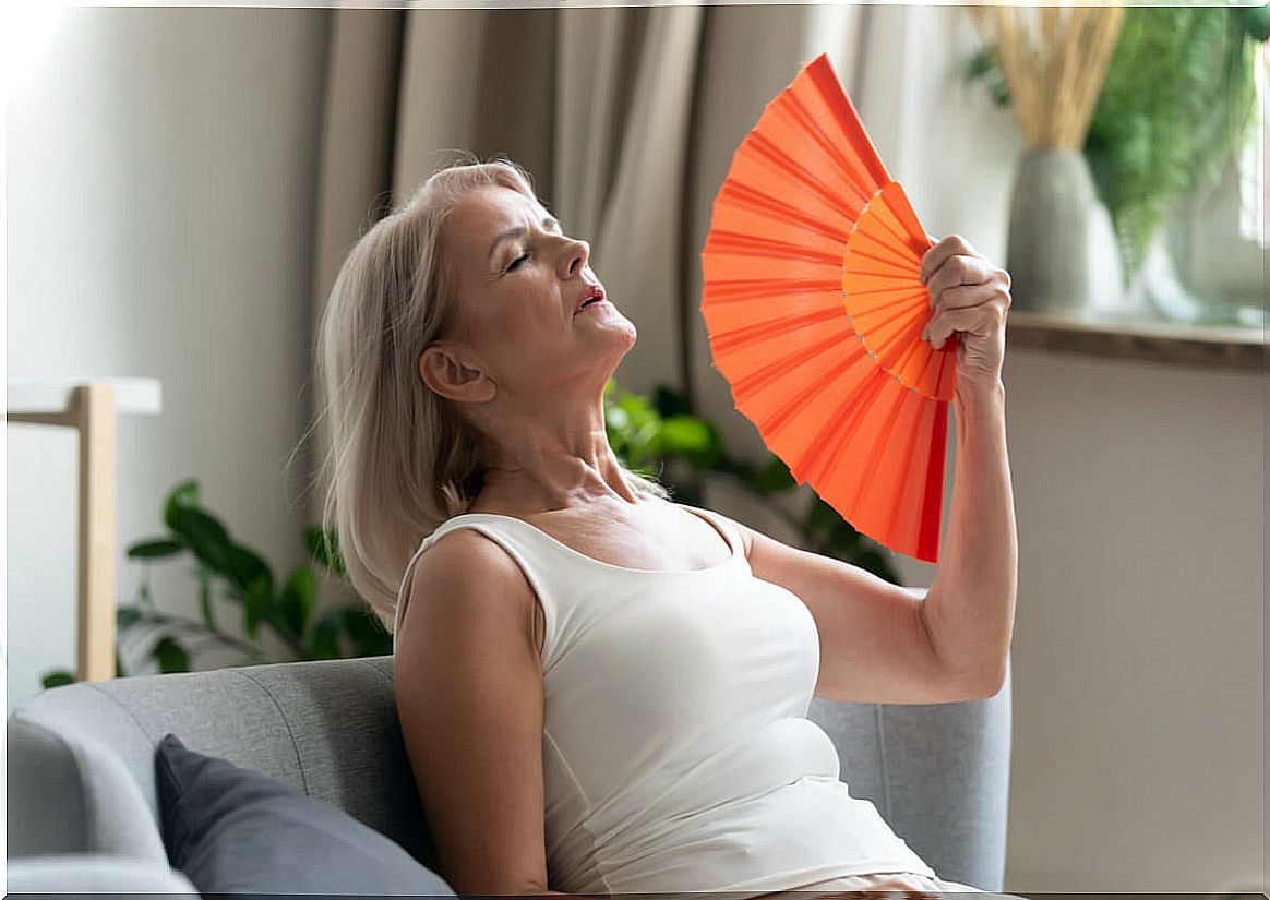 Woman with hot flashes of menopause.