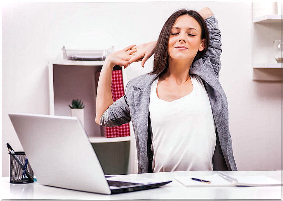 Woman doing stretching in the office