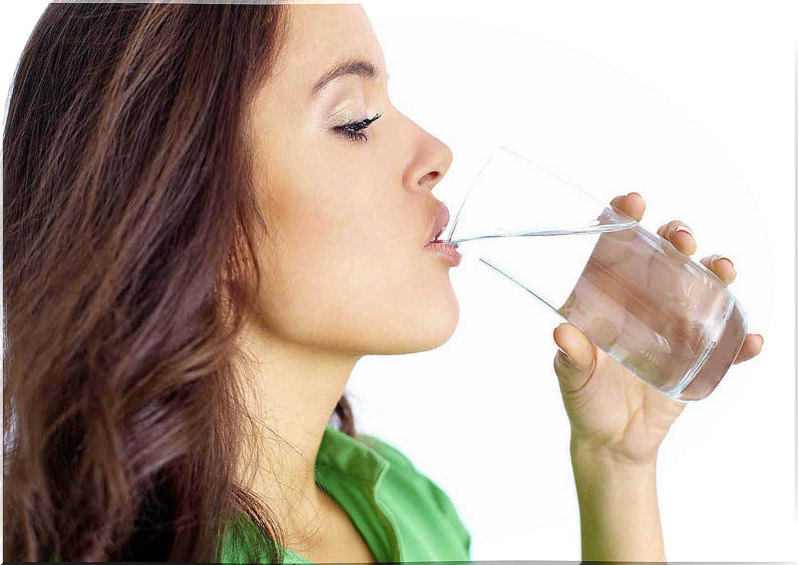 Woman drinking artichoke water.