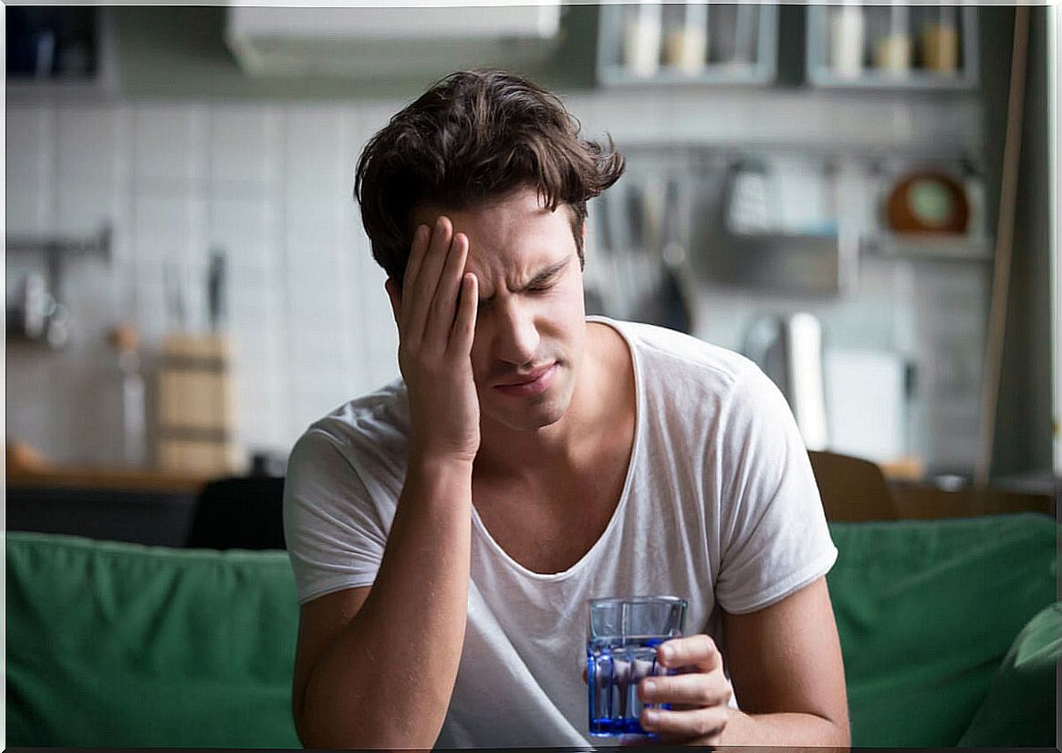 Young man with migraine